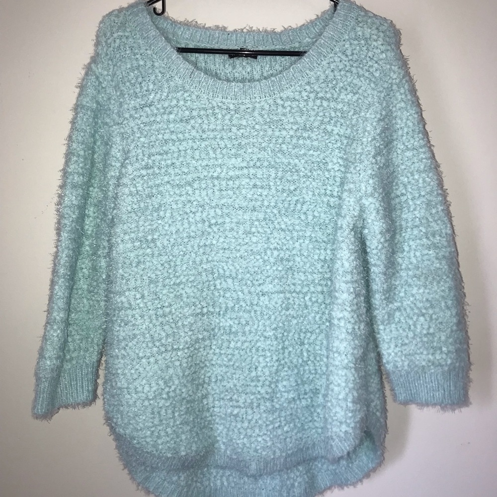 fuzzy blue sweater
